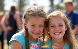 Children enjoying dairy treats at the Laverton Primary School fair, sponsored by Warrnambool Dairy Foods.